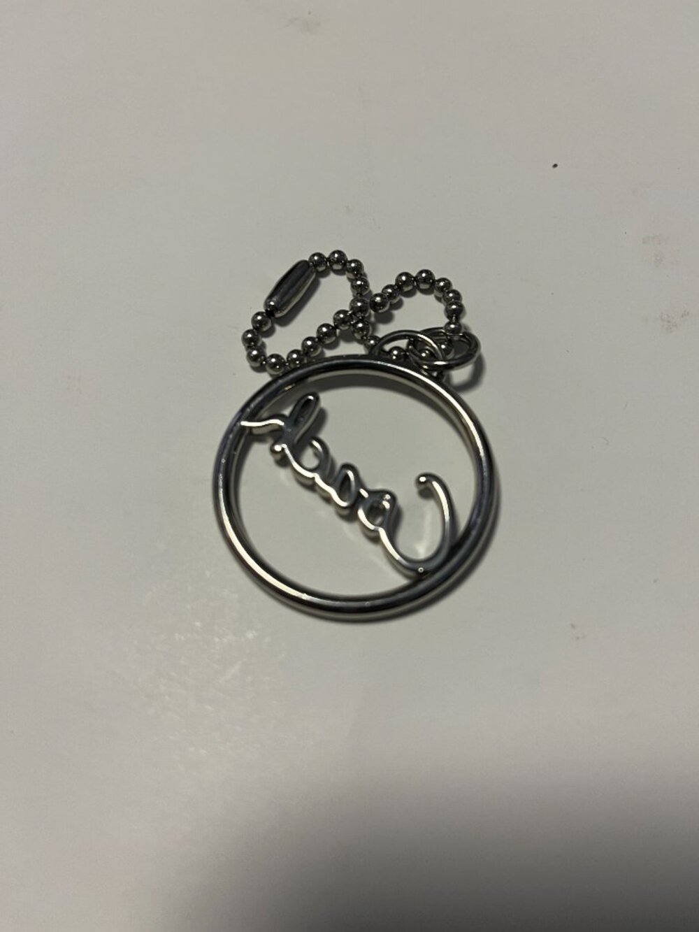 COACH Silver-tone Coach Round Metal Bag Charm - Picture 2 of 3